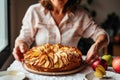 woman admiring her finished apple pie before serving Royalty Free Stock Photo