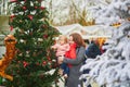 Woman and adorable toddler girl on Christmas market in Paris, France Royalty Free Stock Photo