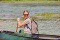 woman adventurous explorer are canoeing in a wild river Royalty Free Stock Photo