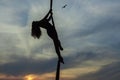 Woman aerial acrobat dances in the air. Royalty Free Stock Photo