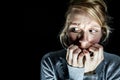 Woman Afraid of something in the Dark Royalty Free Stock Photo