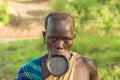 Woman from the African tribe Surma with big lip plate