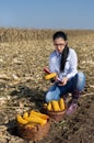 Woman agronomist in corn field