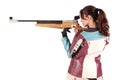 Woman aiming a pneumatic air rifle Royalty Free Stock Photo