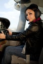 Woman at airplane controls