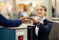 Woman, airport and passenger assistant with passport helping traveler for check in at terminal counter. Female service Royalty Free Stock Photo