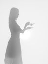 Woman with alladin lamp, silhouette Royalty Free Stock Photo