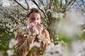 Woman allergic suffering from seasonal allergy at spring. Royalty Free Stock Photo