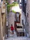 Woman in an alley