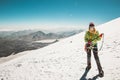 Woman alpinist mountain climbing glacier
