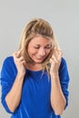 Woman with ambition crossing her fingers for scaring success Royalty Free Stock Photo