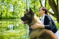 Woman with an American Akita dog