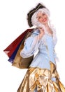 Woman in ancient dress with gift bag. Royalty Free Stock Photo