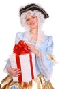 Woman in ancient dress with gift box. Royalty Free Stock Photo