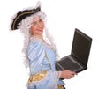 Woman in ancient dress with laptop. Royalty Free Stock Photo