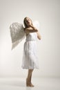 Woman in angel costume. Royalty Free Stock Photo