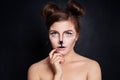 Woman Animal with Artistic Halloween Makeup on Black