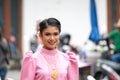 a woman in annual flower festival parade in Thailand