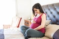 Woman Anticipating About Fetus In Tummy Royalty Free Stock Photo