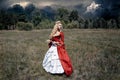 Woman in antique red dress Royalty Free Stock Photo