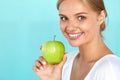 Woman With Apple. Beautiful Girl With White Smile, Healthy Teeth Royalty Free Stock Photo