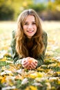 Woman with apple outdoors in autumn Royalty Free Stock Photo