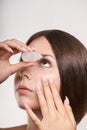 Woman apply eye drops. Girl glaucoma treatment Royalty Free Stock Photo