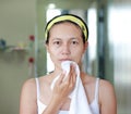 Woman applying aloe vera cream to face Royalty Free Stock Photo