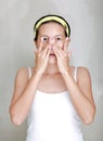 Woman applying aloe vera cream to face Royalty Free Stock Photo