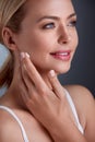 Woman applying anti-aging cream Royalty Free Stock Photo