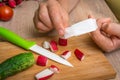 Woman is applying band aid plaster on her finger Royalty Free Stock Photo