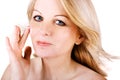 Woman applying face cream Royalty Free Stock Photo