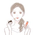 Woman applying lip gloss. On a white background
