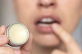 woman applying on lips balm or scrub from natural ingredients Royalty Free Stock Photo