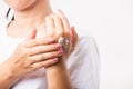 Woman applying lotion cosmetic moisturizer cream on her behind the palm skin hand Royalty Free Stock Photo