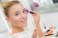 Woman applying mascara Royalty Free Stock Photo