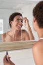 Woman Applying Mascara In Mirror At Home Royalty Free Stock Photo