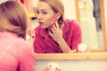 Woman applying moisturizing skin cream. Skincare. Royalty Free Stock Photo