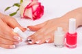 Woman applying nail polish Royalty Free Stock Photo