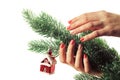 Woman applying nail varnish to finger nails