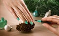 Woman applying nail varnish to finger nails Royalty Free Stock Photo