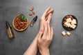 Woman applying organic cocoa butter at tablÃÆ