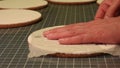 Woman applying paste on cortical table