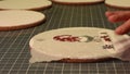 Woman applying paste on cortical table