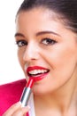 Woman applying red lipstick Royalty Free Stock Photo