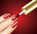 Woman applying red nail polish