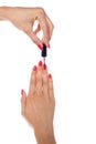 Woman applying red nail polish Royalty Free Stock Photo