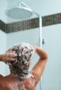 Woman applying shampoo in shower Royalty Free Stock Photo