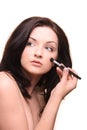 Woman applyng make-up