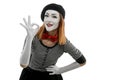 Woman appreciates and shows OK gesture. Waist up portrait of a mime actress